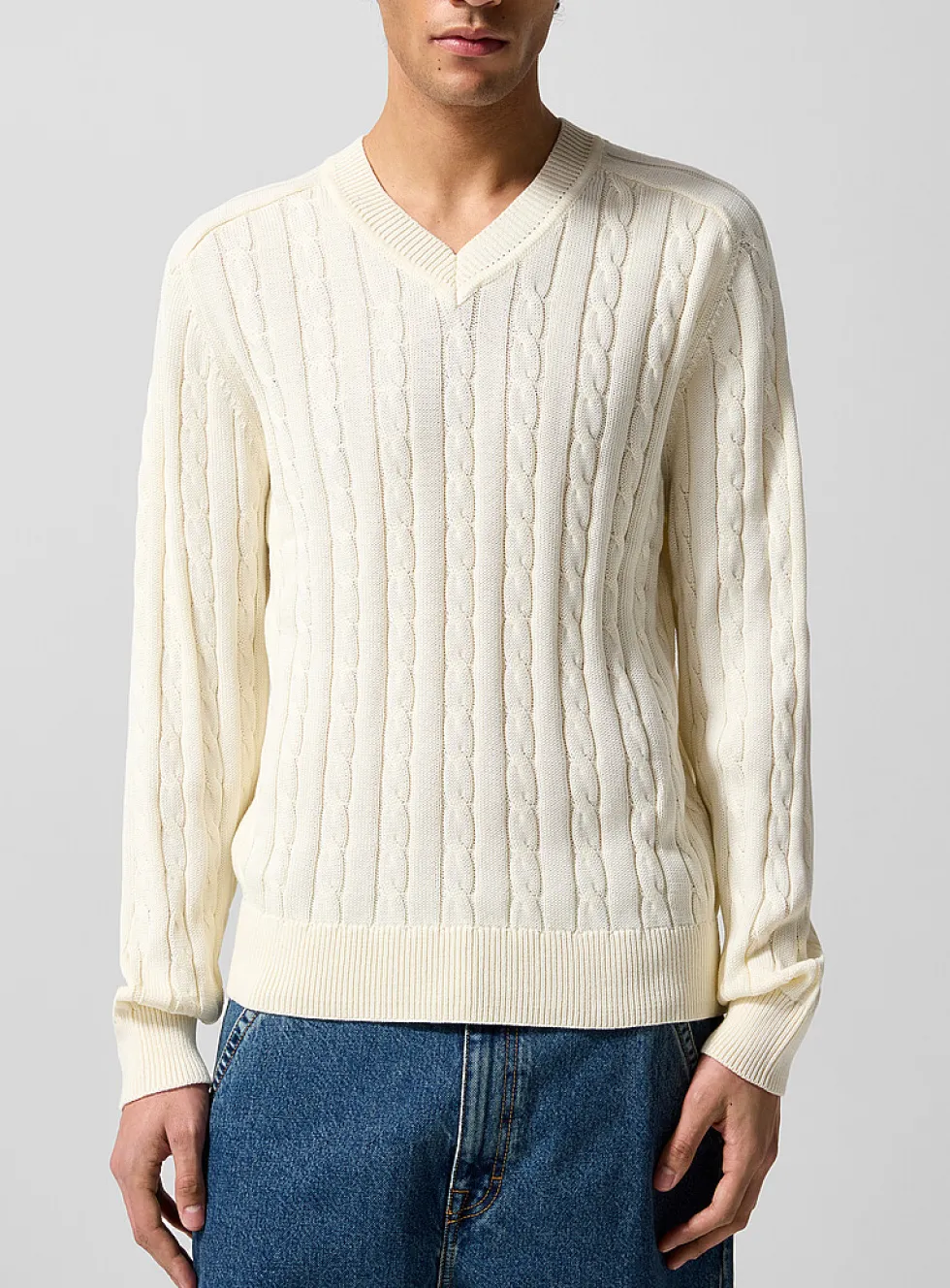 Cable-knit V-neck sweater