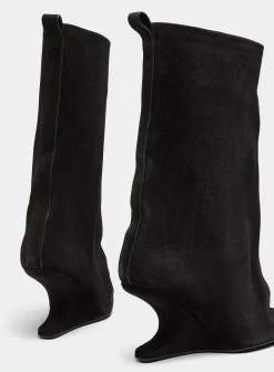 Cantilever heel flared suede boots