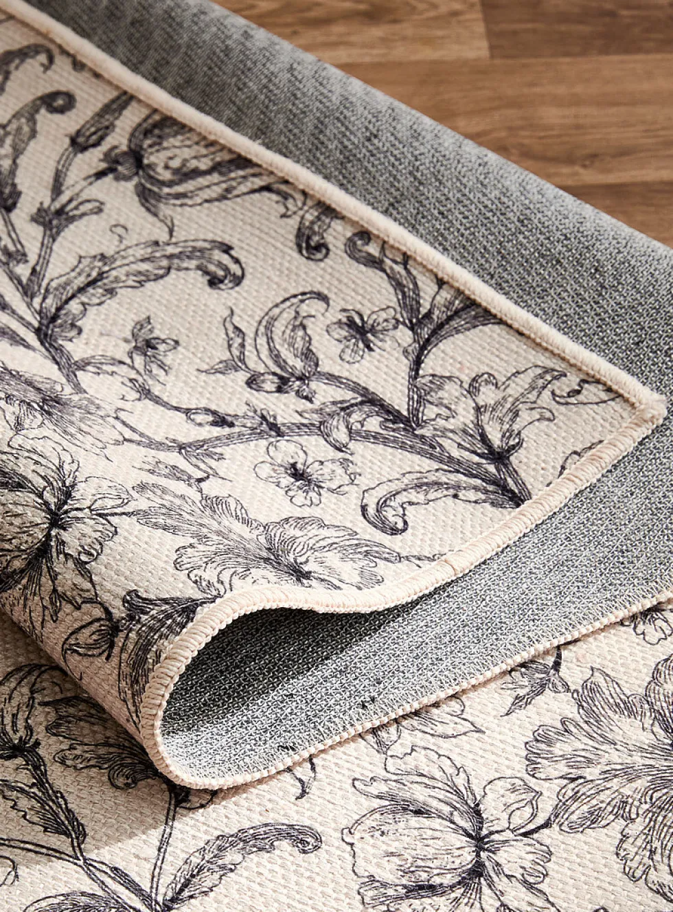 Charcoal flowers woven hallway rug