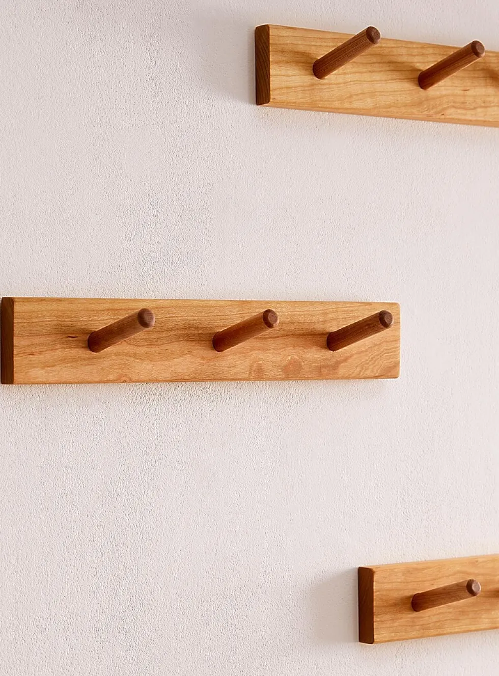 Cherry pegs wall-mounted coat rack