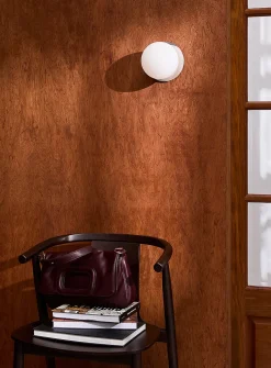 Chrome celestial globe sconce