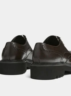 Chunky notched sole leather brogue shoes