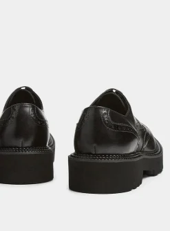 Chunky notched sole leather brogue shoes