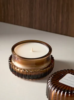 Cinnamon and sandalwood scented candle