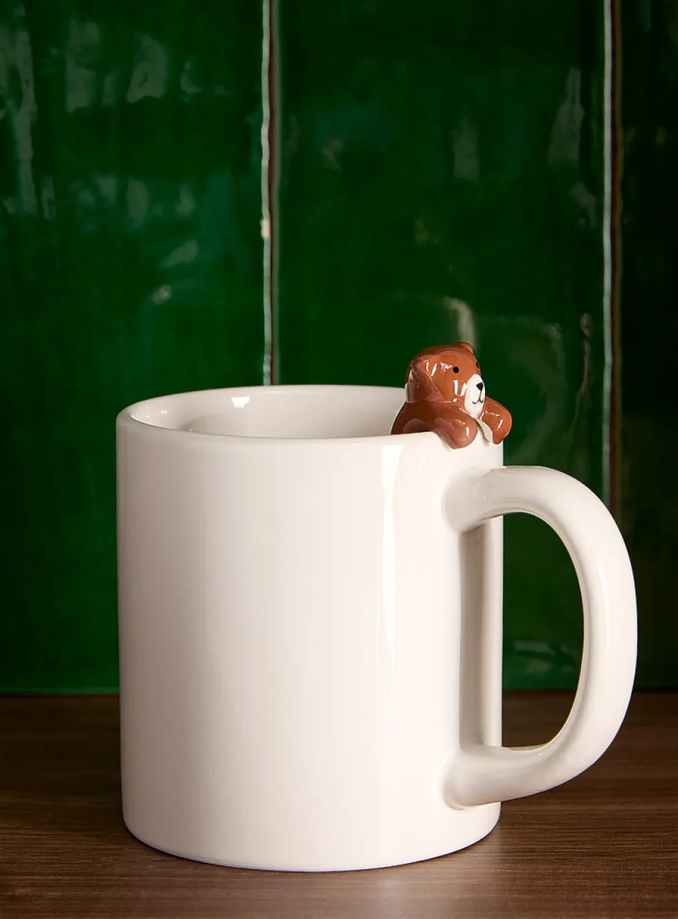 Climbing bear cub mug