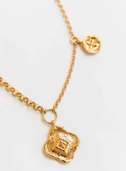 Colliding compass necklace