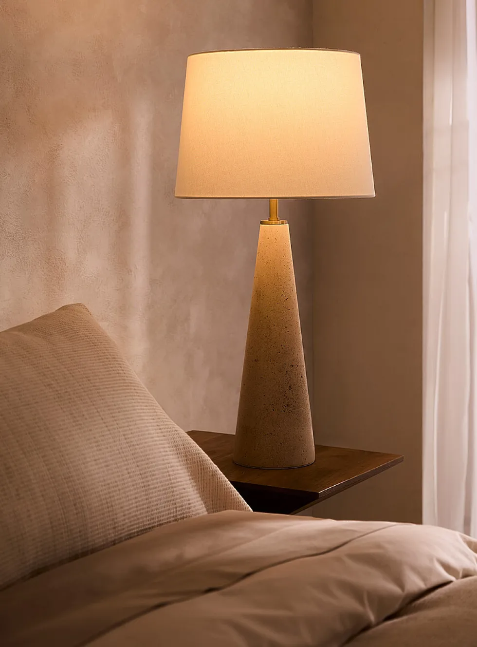 Cone-shaped travertine base table lamp