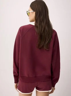 Contrasting collar and embroidery fleece sweater