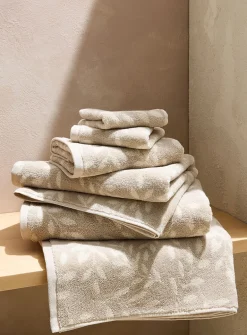 Contrasting leaves organic cotton reversible towels