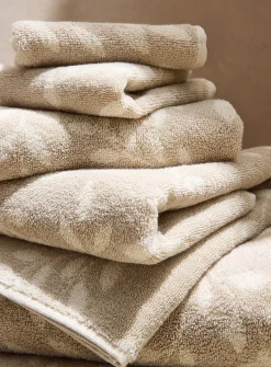 Contrasting leaves organic cotton reversible towels