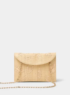 Contrasting leaves raffia clutch