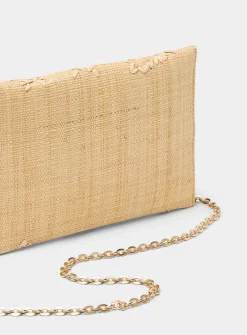 Contrasting leaves raffia clutch