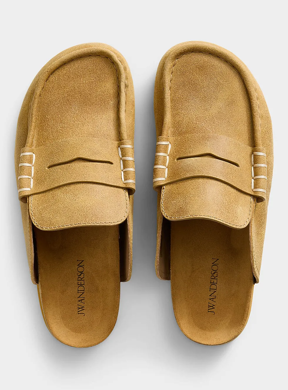 Contrasting stitching penny slit mules
