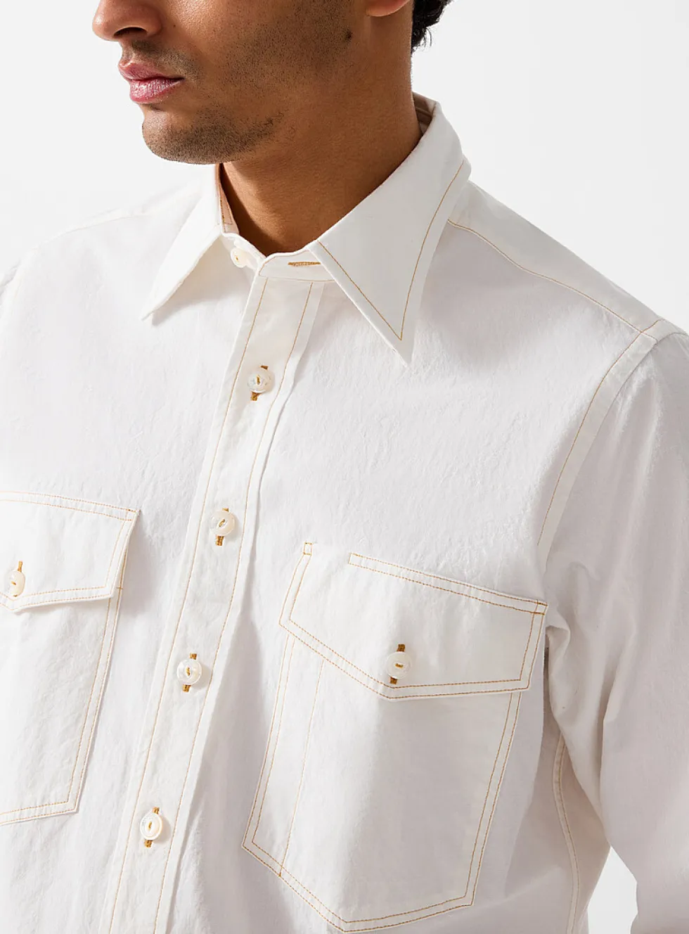 Contrasting topstitching patch pockets shirt