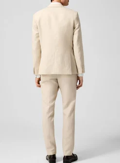 Cream-coloured shawl-collar tuxedo suit
