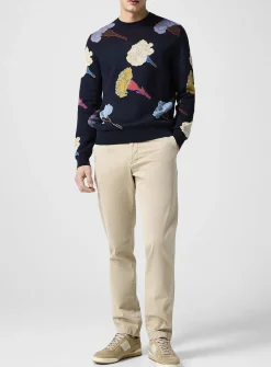 Cream-coloured tapered chino pant