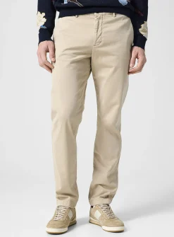Cream-coloured tapered chino pant