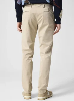 Cream-coloured tapered chino pant