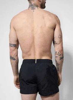Crisp nylon-feel solid cropped swim trunk