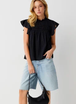 Crochet and Swiss dot ruffled collar blouse