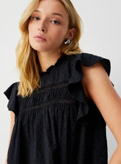 Crochet and Swiss dot ruffled collar blouse