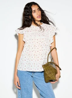 Crochet and Swiss dot ruffled collar blouse
