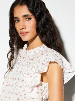 Crochet and Swiss dot ruffled collar blouse