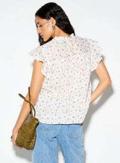 Crochet and Swiss dot ruffled collar blouse