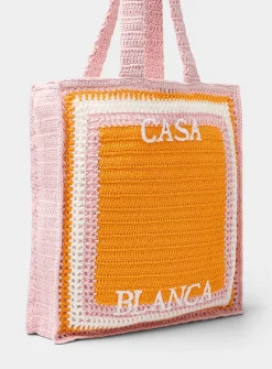 Crocheted knit logo tote bag