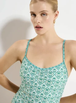 Cross-strap trimmed one-piece