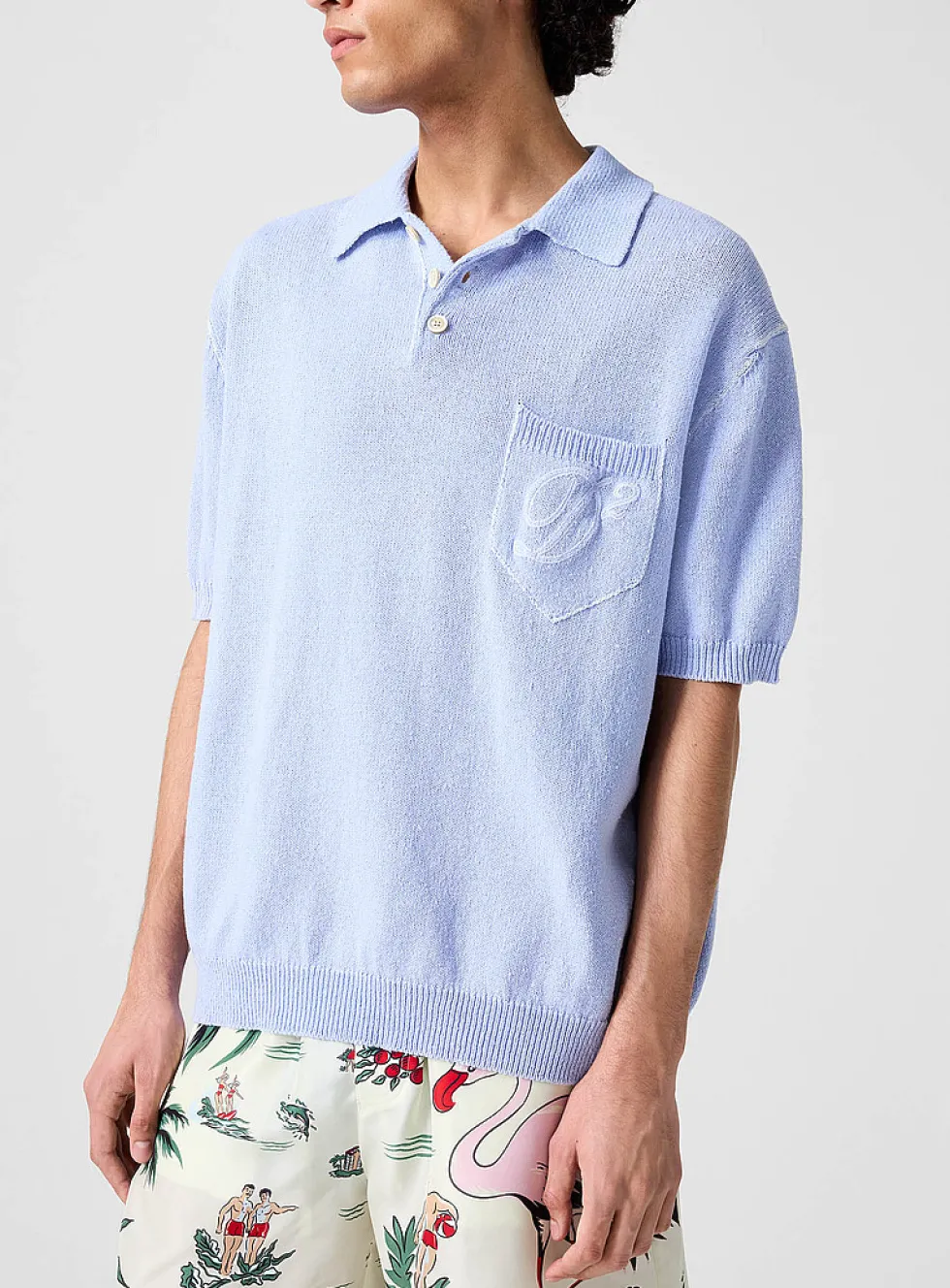 Cursive logo knit polo