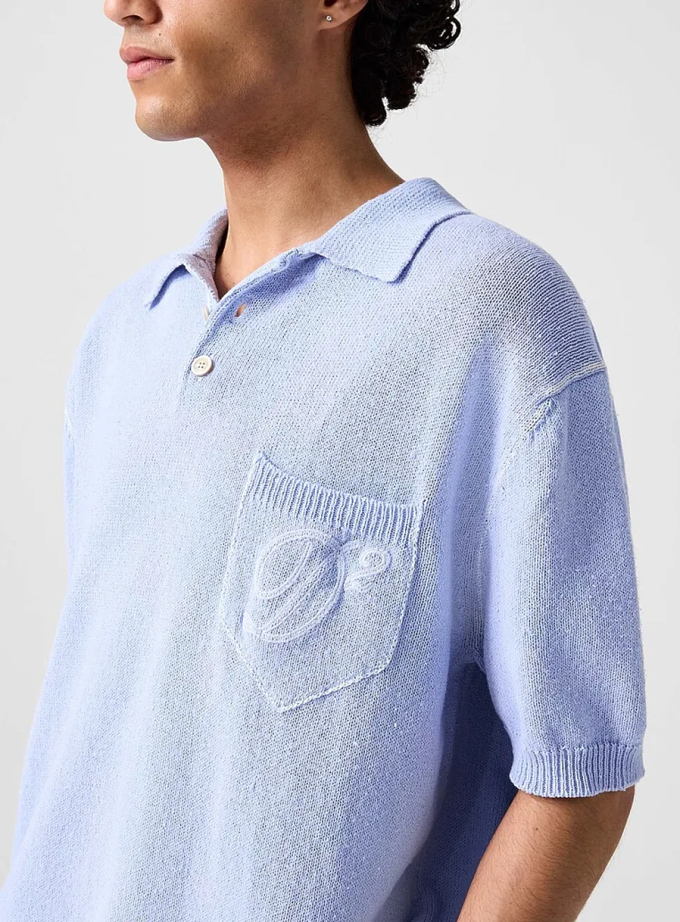 Cursive logo knit polo
