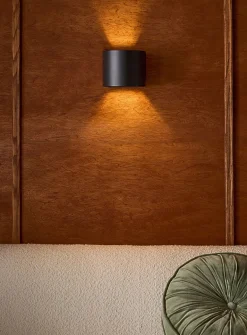 Curved modern sconce