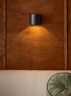 Curved modern sconce