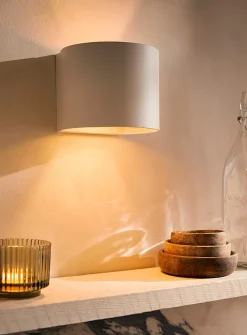 Curved modern sconce