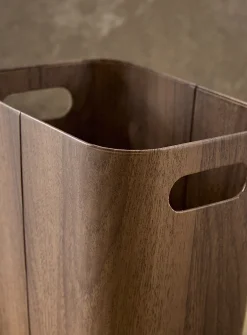 Dark faux-wood wastebasket