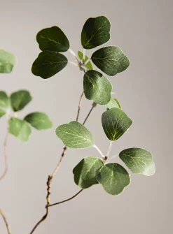 Delicate foliage artificial branch
