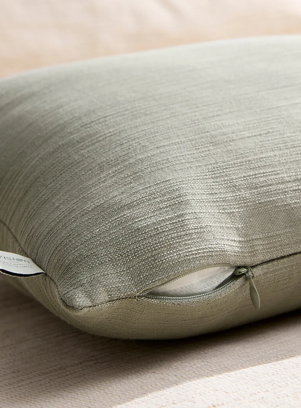 Delicately textured removable cover cushion