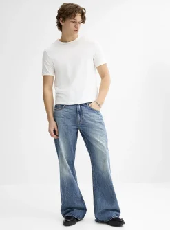 Diagonal seam faded-blue jean