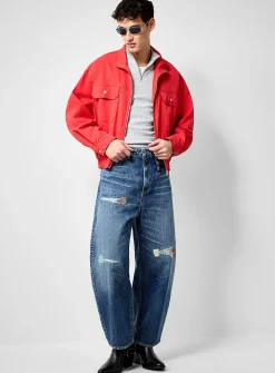 Distressed dark-blue jean