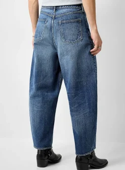 Distressed dark-blue jean