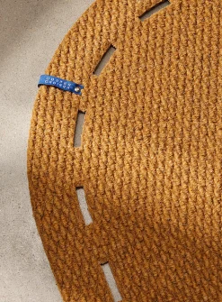 Dotted cutouts oval doormat