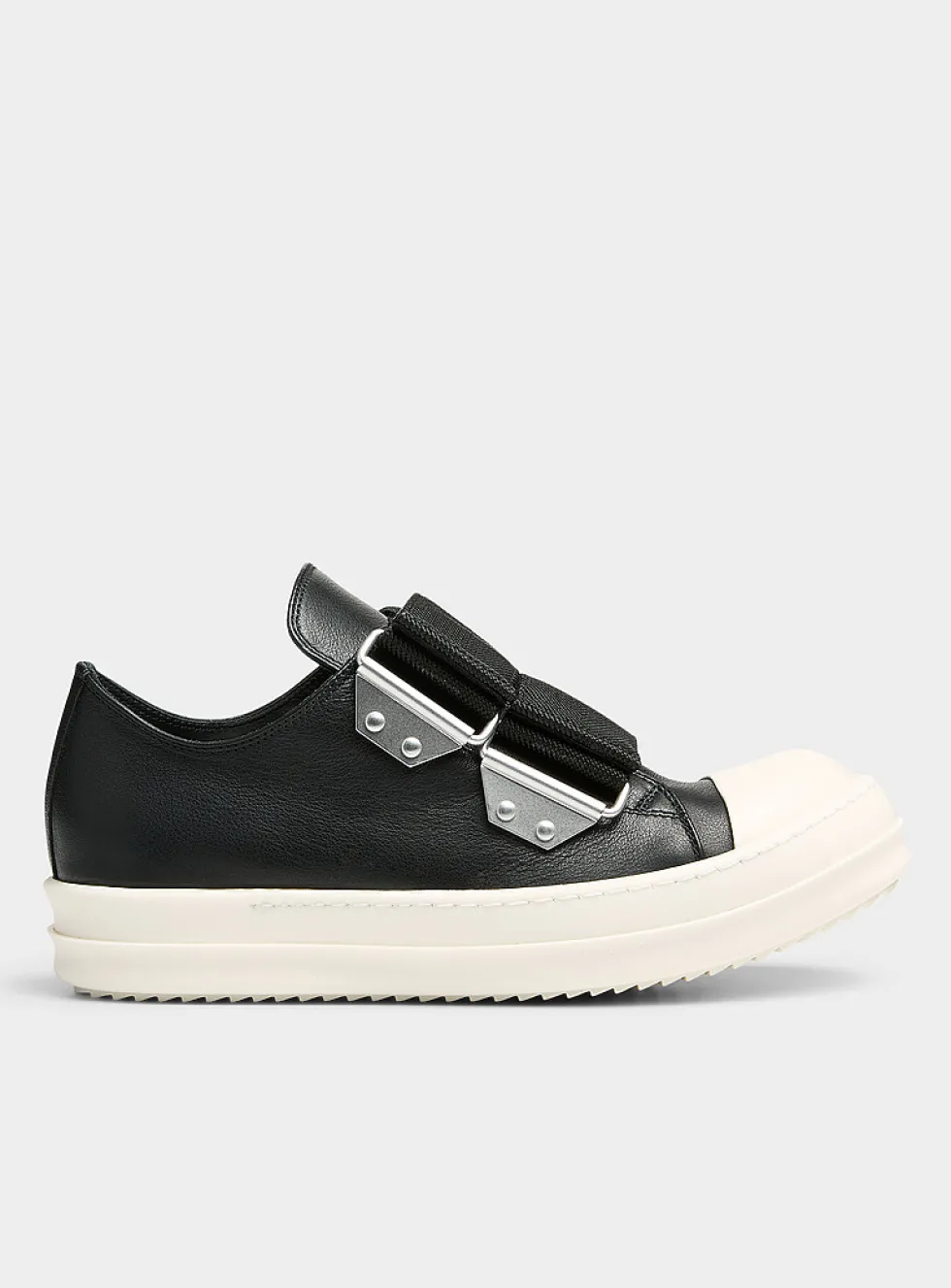 Double-strap low-top leather sneakers
