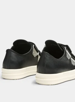 Double-strap low-top leather sneakers