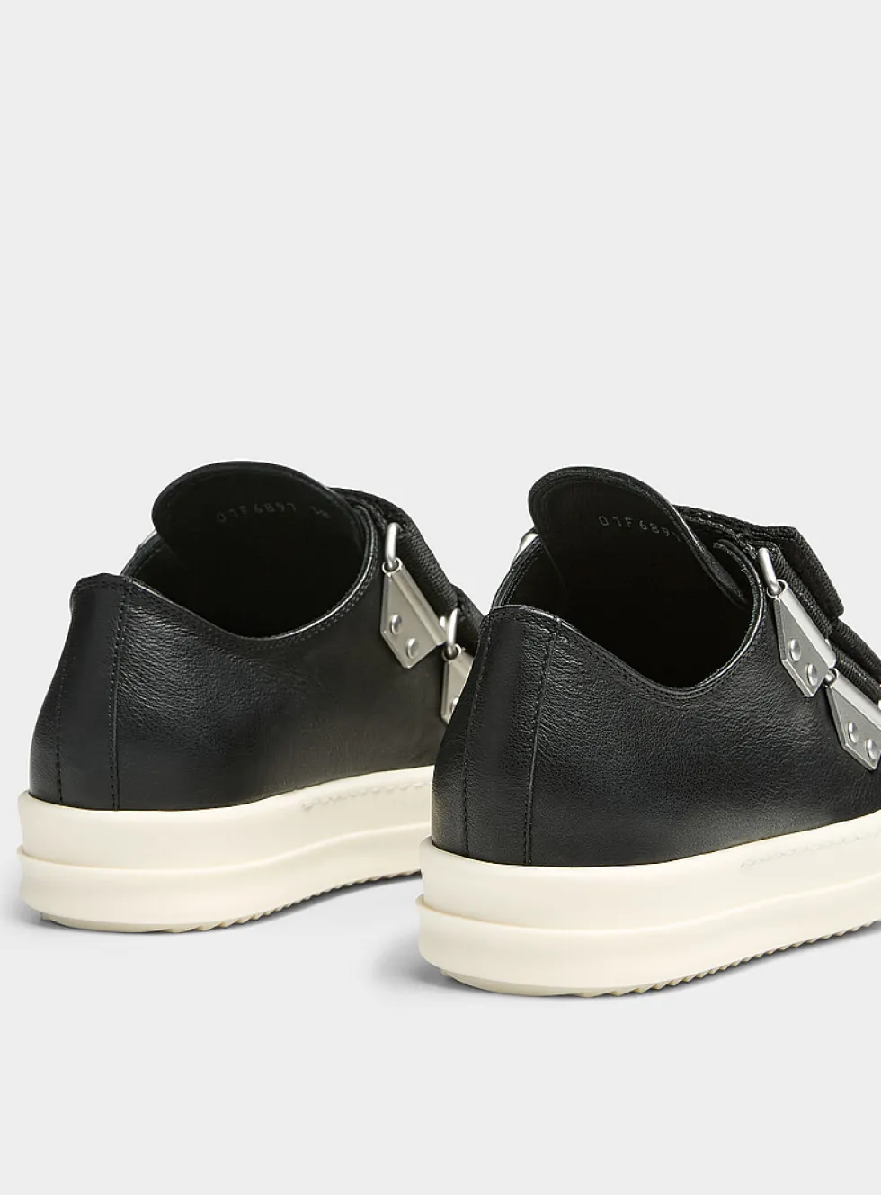 Double-strap low-top leather sneakers