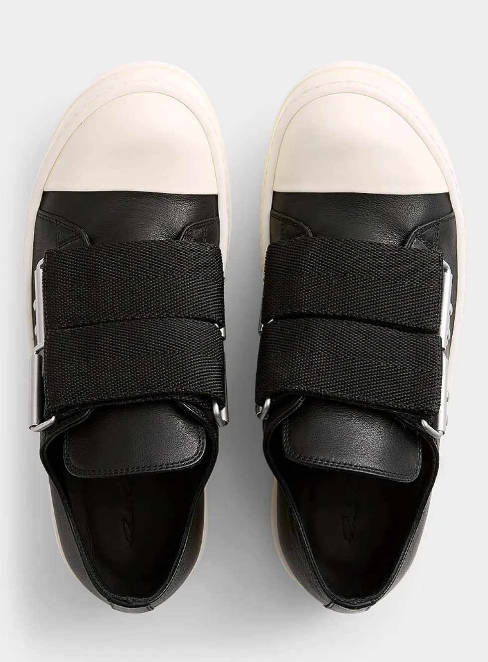 Double-strap low-top leather sneakers