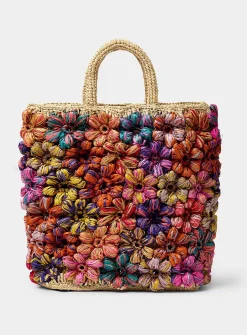 Embossed flower straw tote bag