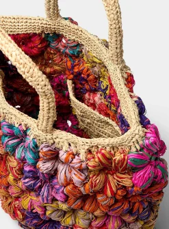 Embossed flower straw tote bag
