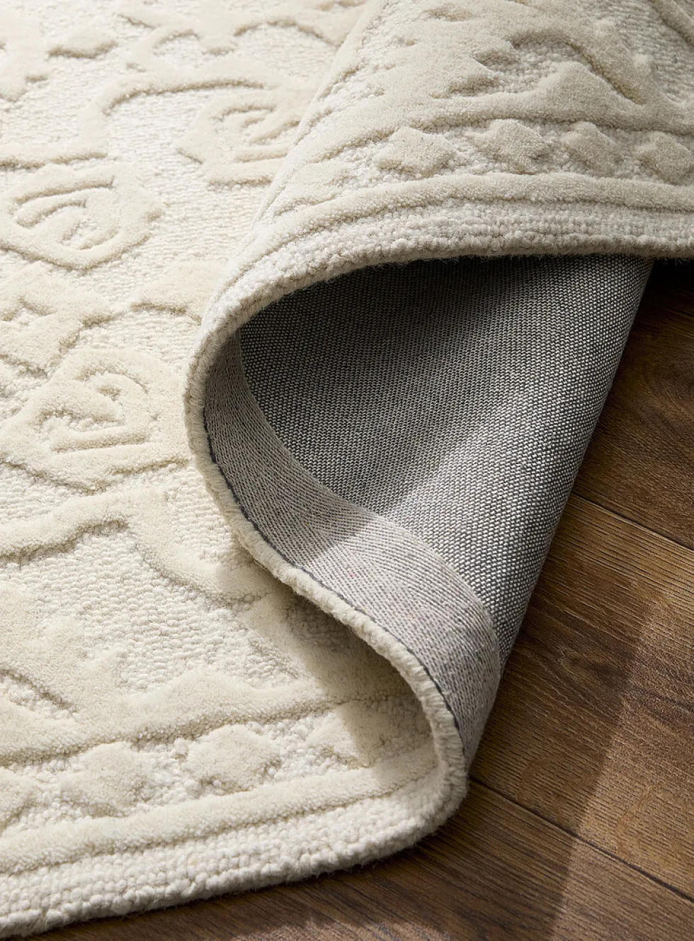 Embossed flowers plain handmade rug