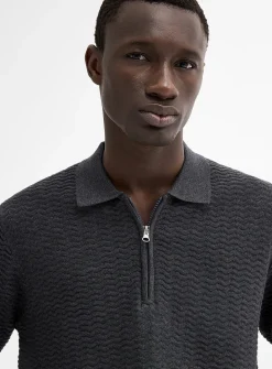 Embossed herringbone knit polo